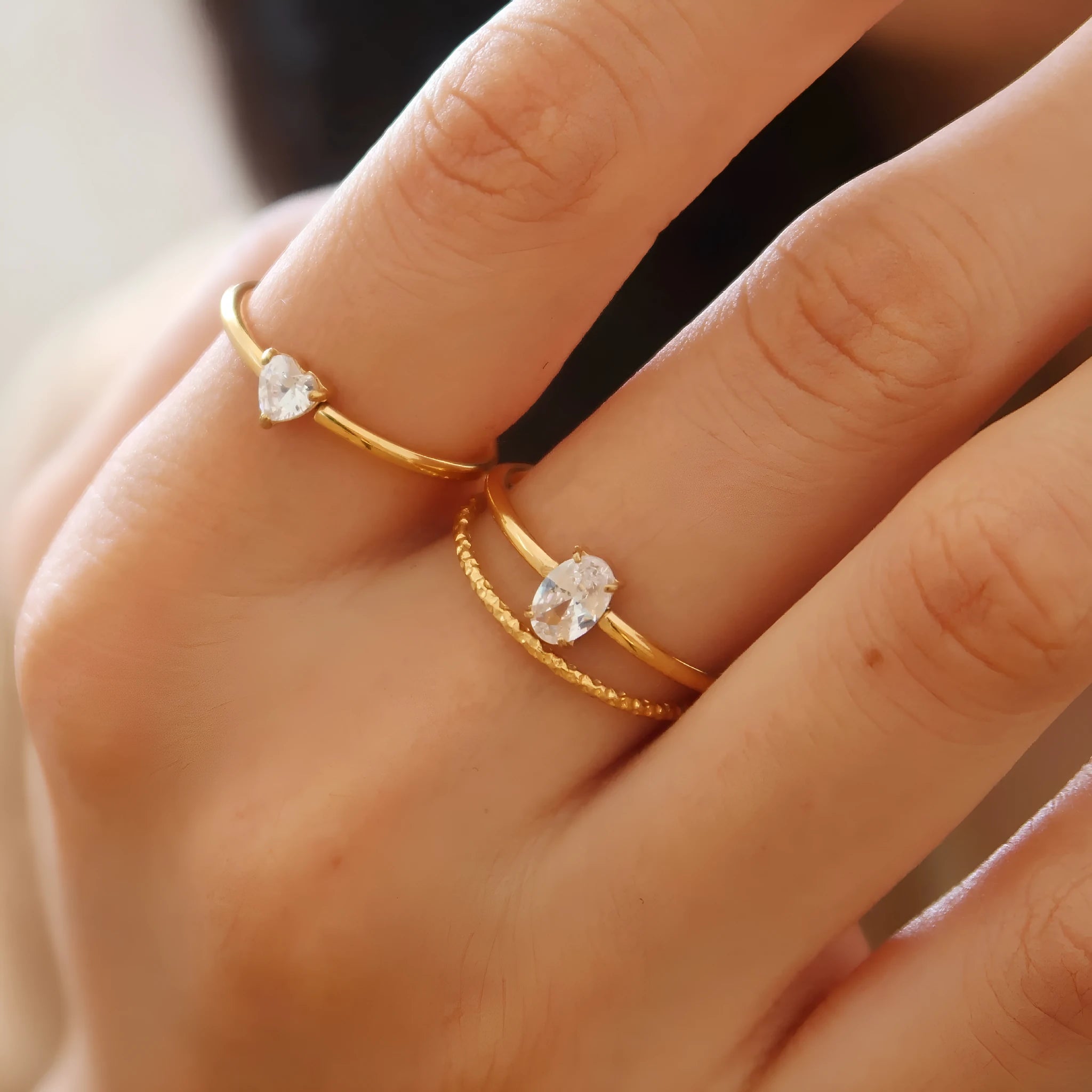 Golden electroplated stainless steel women's bracelet in heart and oval designs with size options