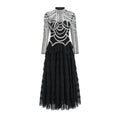 Women's black beaded long sleeve formal dress with floor-length skirt