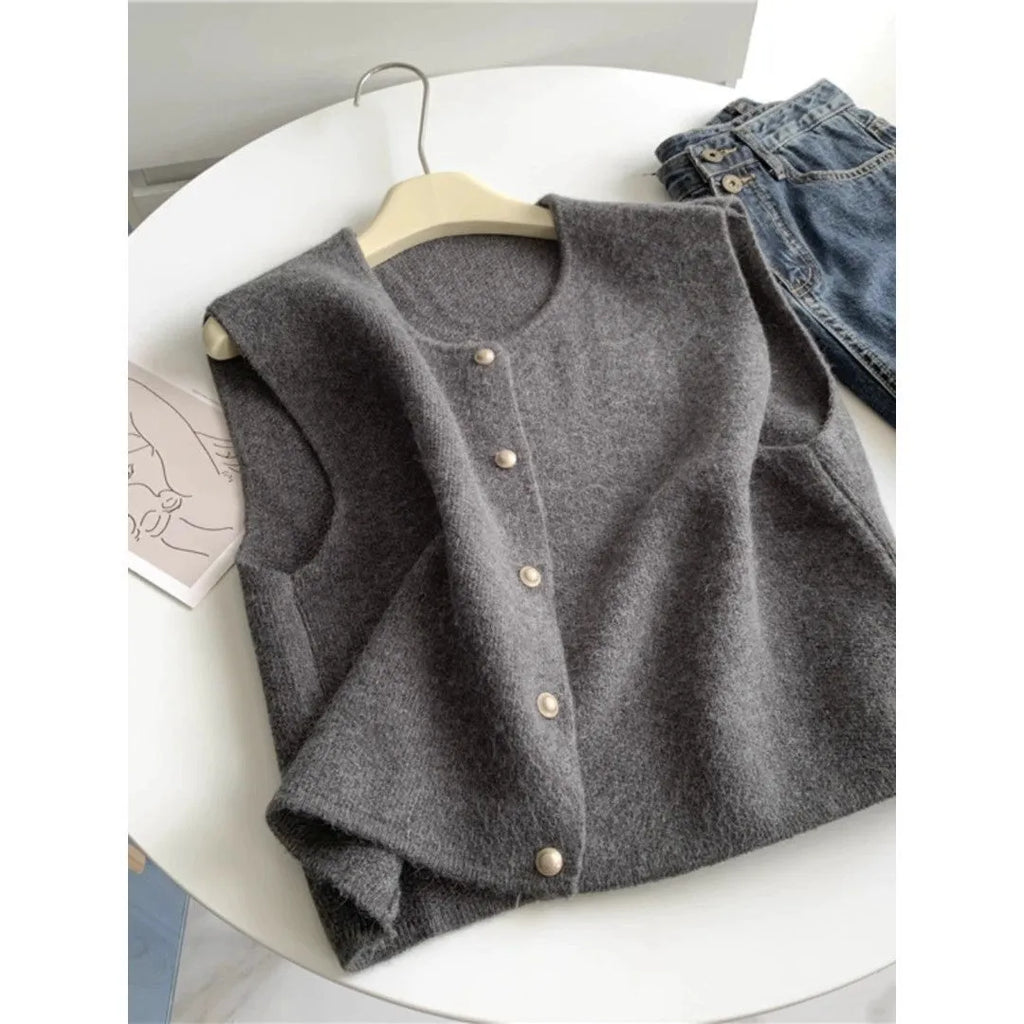 A thin, half-sleeve polyester pullover top shown in a choice of smoky grey, greige, apricot, golden camel, black, or Angora red.