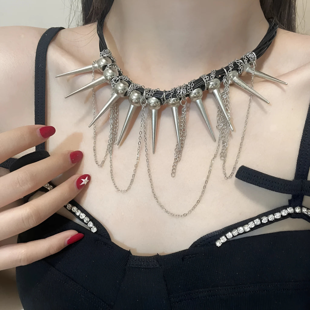 Women's leather necklace with electroplated rivets and a winding beaded tassel pendant