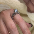 Geometric copper ring with black pearl and adjustable opening for women.