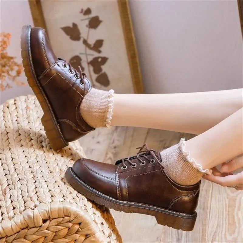 Women's black preppy Mary Jane low-heel pumps with round toe and front lace-up design
