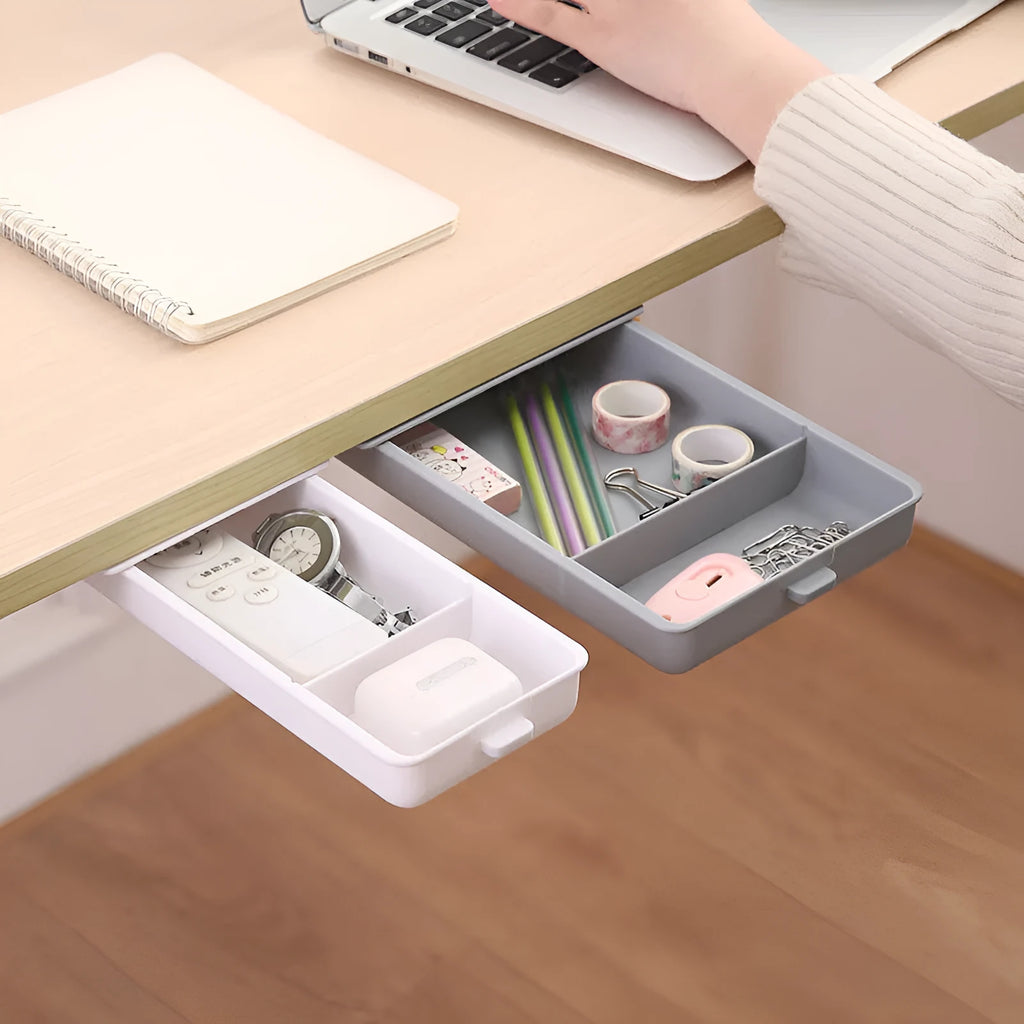Adhesive under-table plastic storage drawer with covered design and grid pattern organisation in solid colours