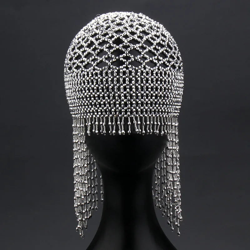 Handmade beaded belly dance hat with tassel decorations in silver colour