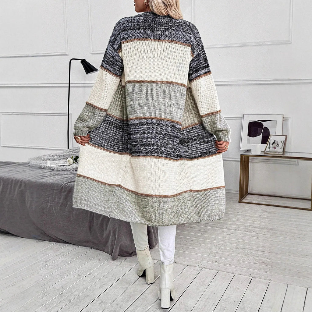 Grey loose fit women's knitted cardigan with long sleeves on hanger