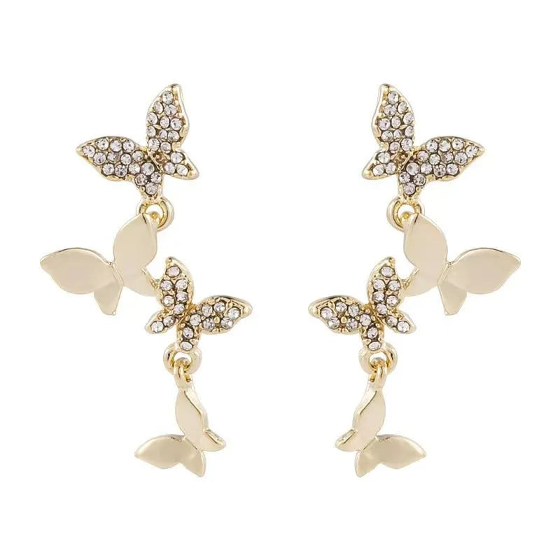 Women's copper butterfly drop earrings with gold-coloured four-butterfly design