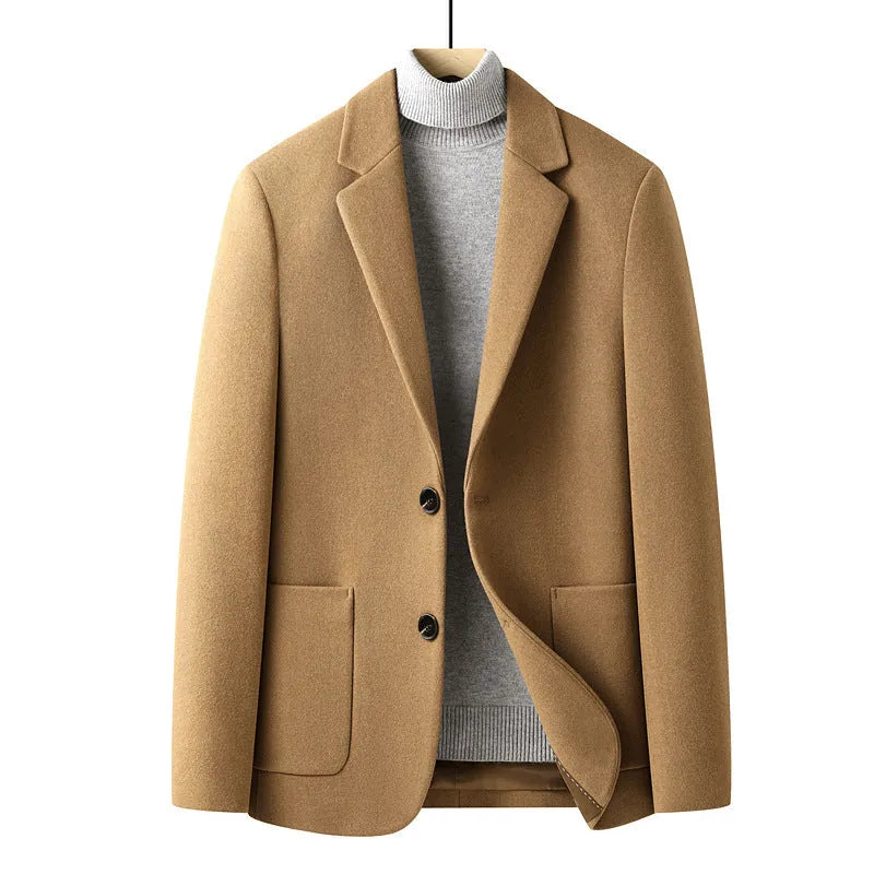 Men's grey slim fit wool blend suit jacket with notch lapel, shown on a model.