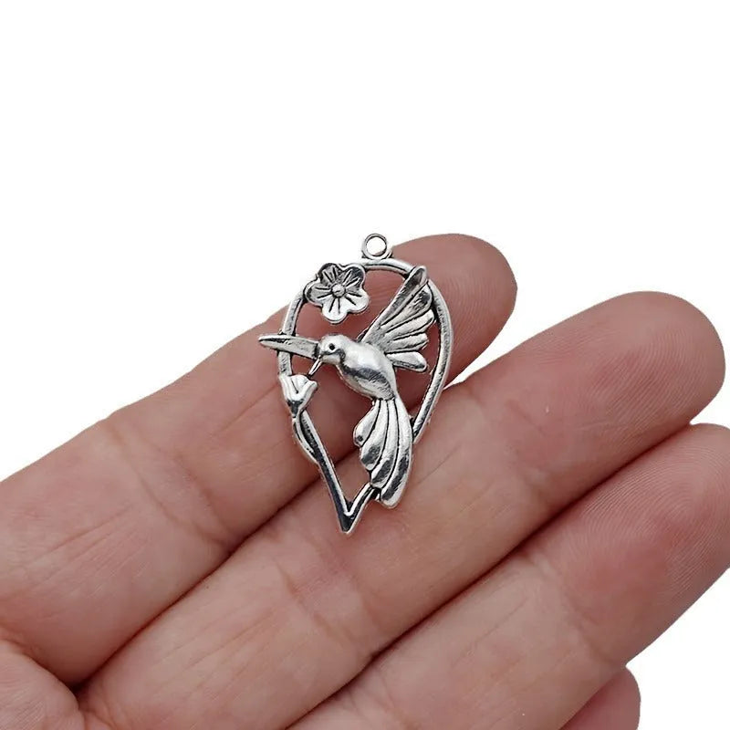 Alloy magpie pendant with electroplated finish for DIY jewellery projects