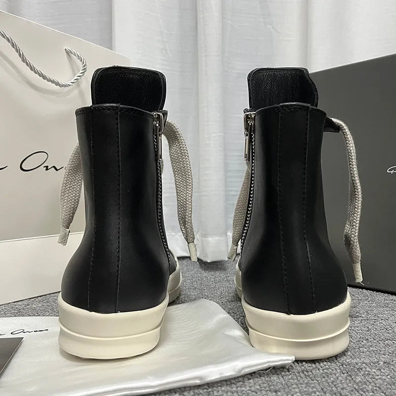 High-top leather sneakers with side zipper in black, white, and red colour options