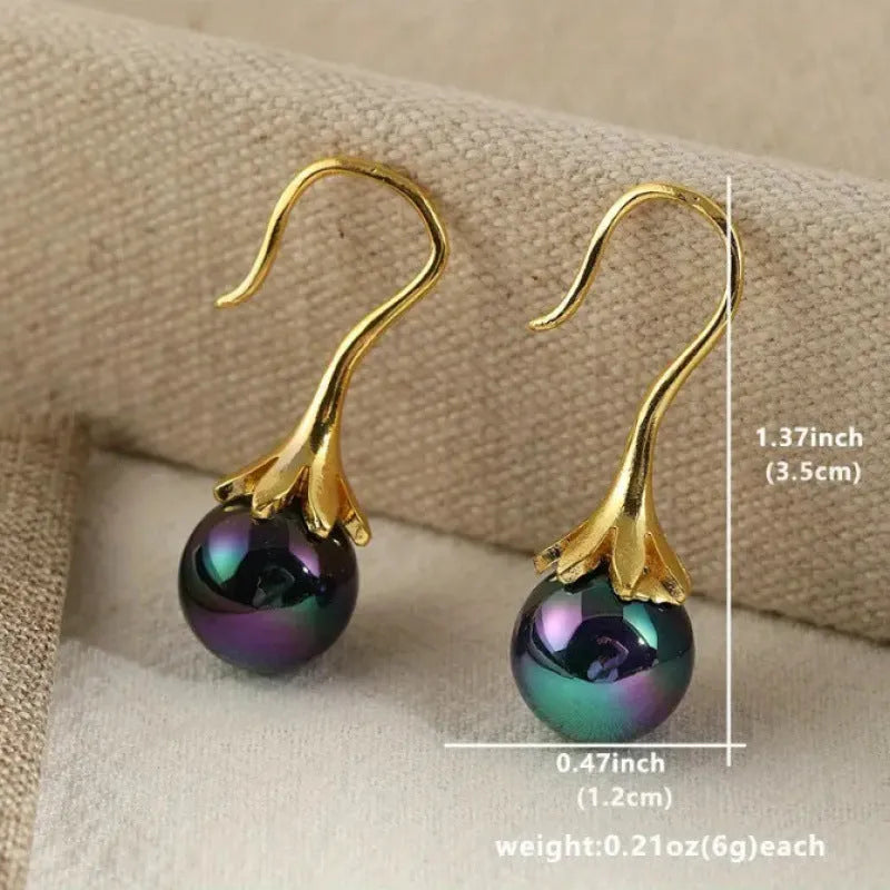 Retro fashion women's earrings with gold electroplating on alloy, personalised creative design