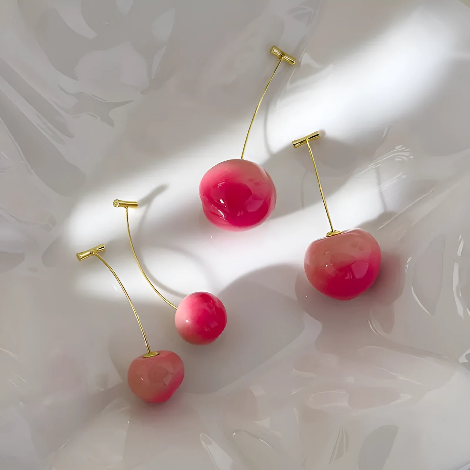 Handmade acrylic peach fruit earrings showing small and large size options with copper findings