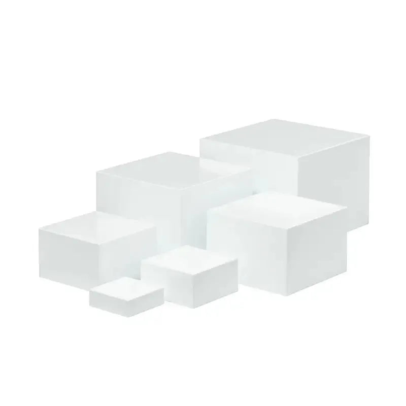 White plastic Suit Cube dessert display stand with six tiers showing cupcakes