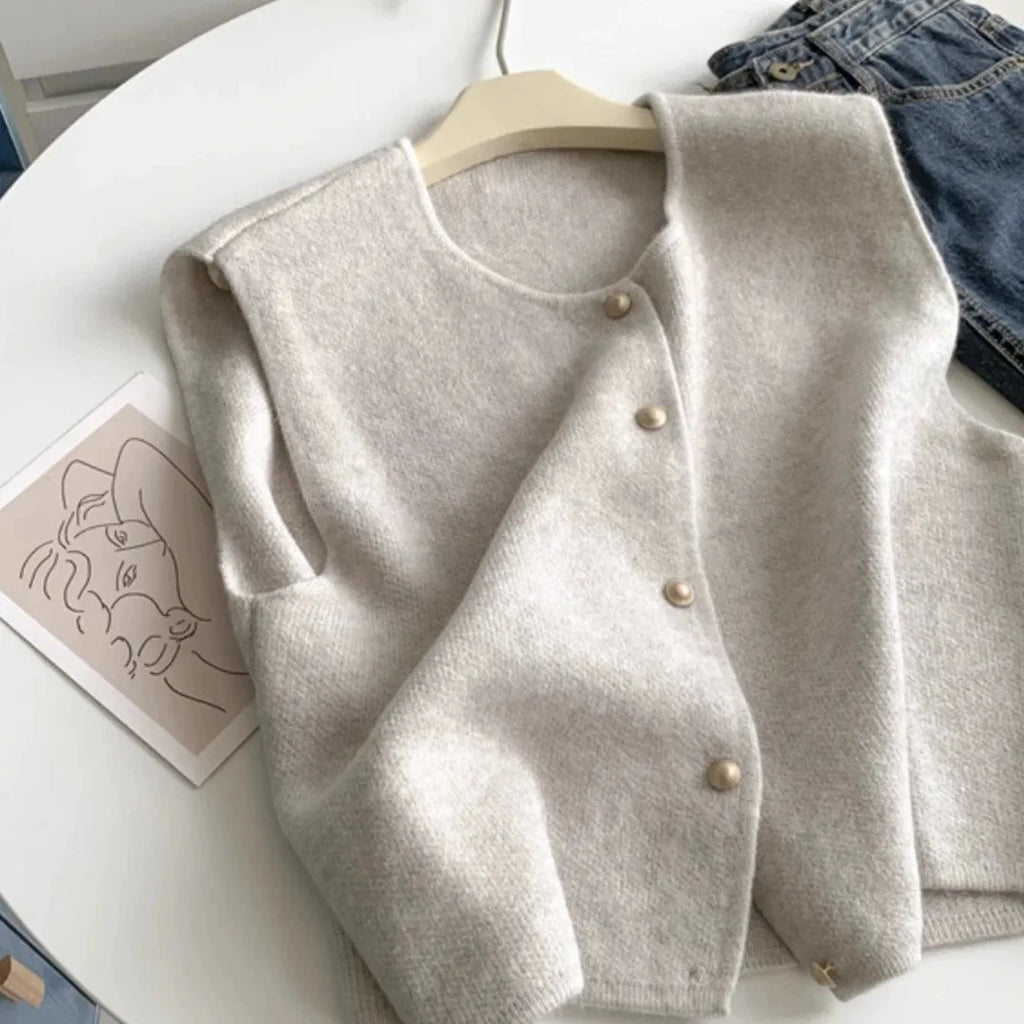 A thin, half-sleeve polyester pullover top shown in a choice of smoky grey, greige, apricot, golden camel, black, or Angora red.