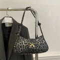 Large capacity casual women's handbag in medium-soft PU leather with sandwich pocket design