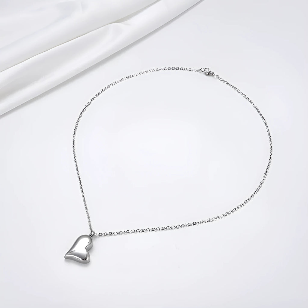 Silver curved peach heart stainless steel pendant necklace with adjustable chain length