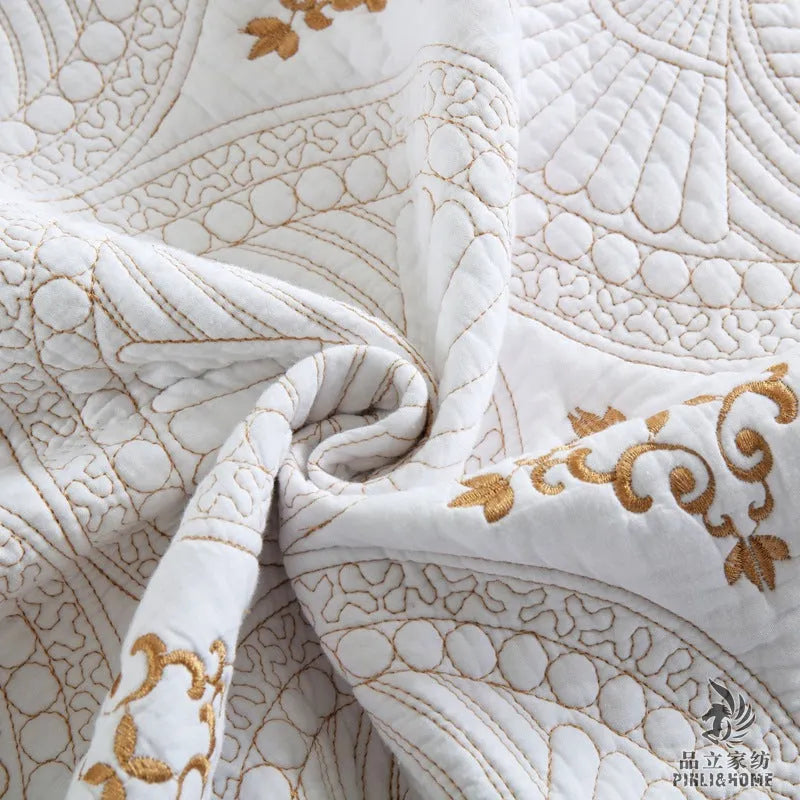 Pure cotton embroidered bedspread and pillowcase set in solid colour on a 1.8 metre bed.