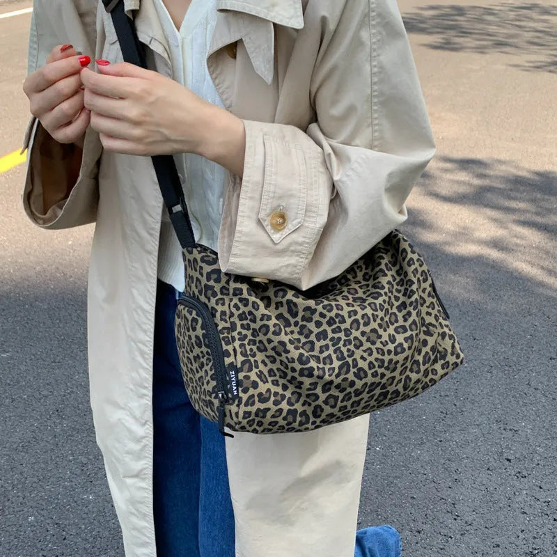 Large capacity leopard print crossbody shoulder bag with sports style stitching details