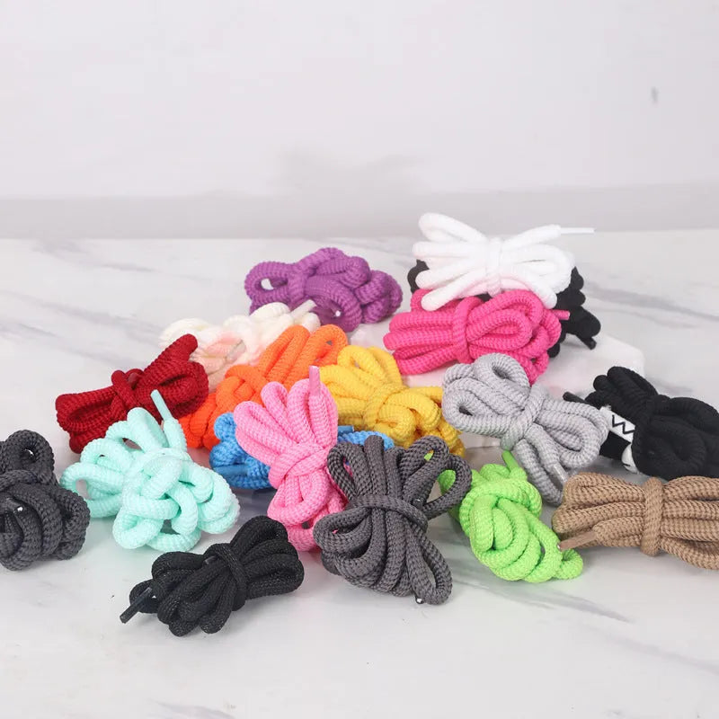 Oval shoelace adapter ropes in multiple colours on a white background, showing the round style.