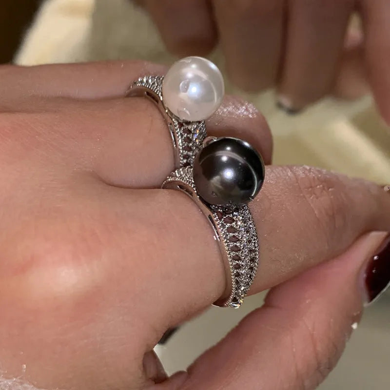Geometric copper ring with black pearl and adjustable opening for women.