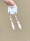 Geometric women's ear clip earrings with rhinestones, heart motifs, star accents, and dangling tassels on alloy with electroplated finish