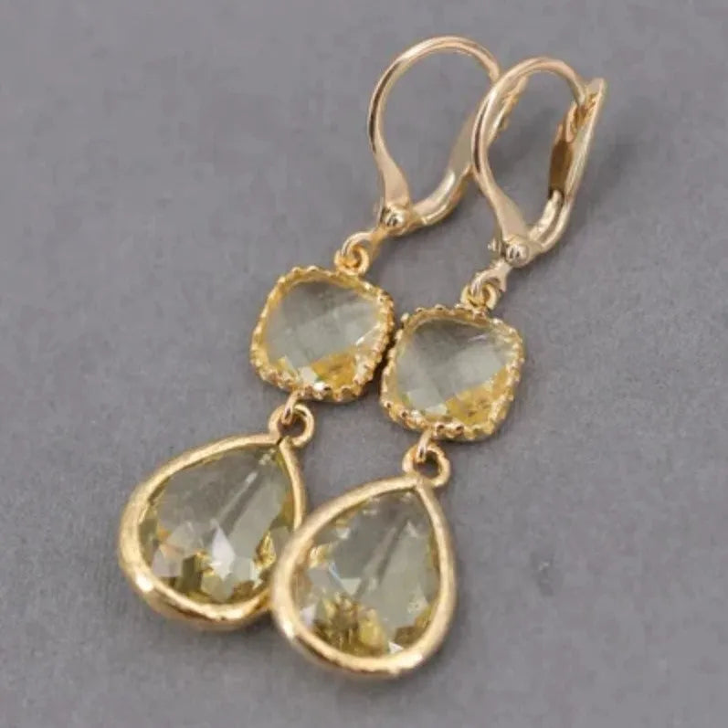 Gold geometric long fringe earrings with water droplet crystals on copper