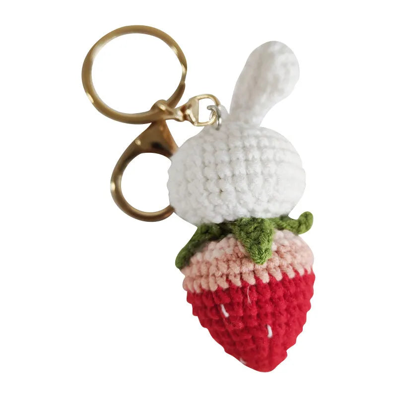 Hand-woven colourful doll wire pendant shaped as a rabbit with a strawberry design, featuring a key loop.