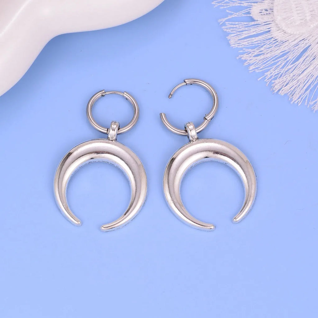 Silver alloy clip-on hoop earrings with gothic moon design and punk style geometric shape