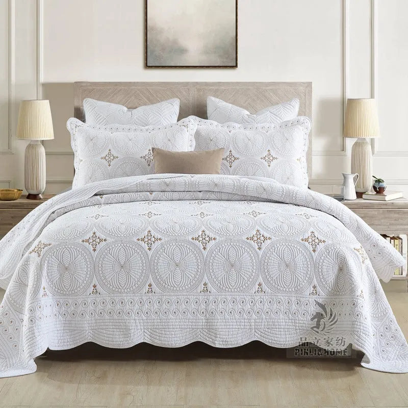 Pure cotton embroidered bedspread and pillowcase set in solid colour on a 1.8 metre bed.