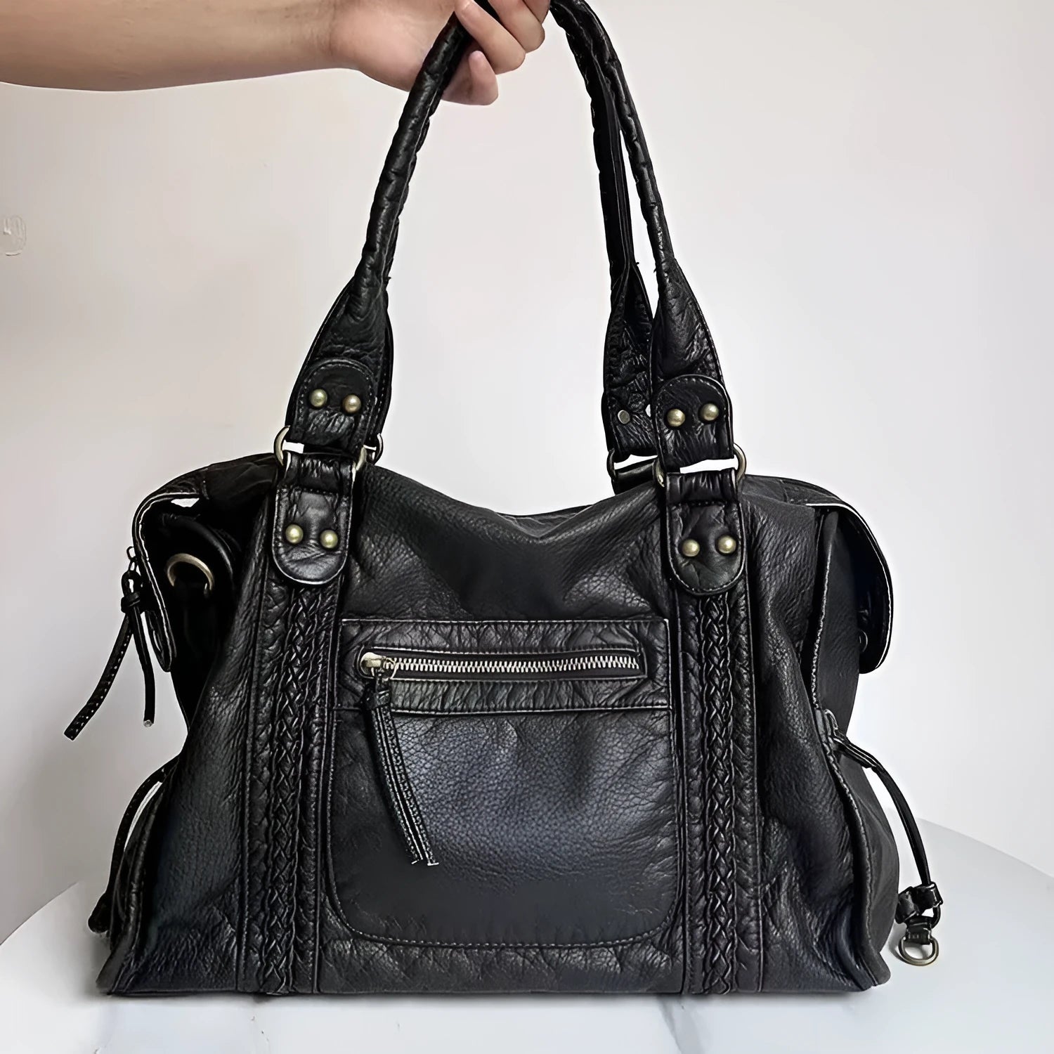Women's brown soft PU leather retro messenger bag with a single shoulder strap, shown open to reveal internal zippered organisers.