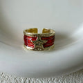 Adjustable copper geometry ring with distressed XINGX drop oil design in choice of colours.