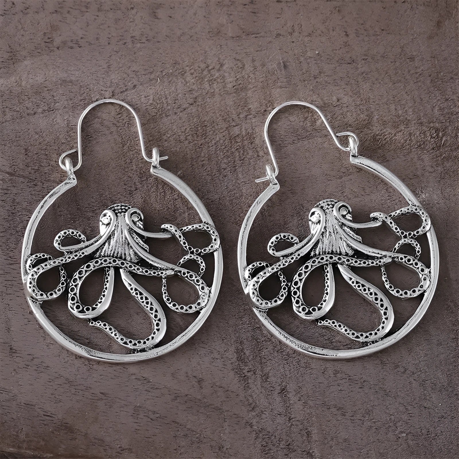 Vintage antique silver octopus earrings with electroplated finish and animal zodiac modelling
