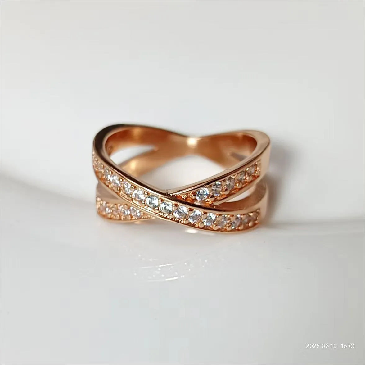 Silver and rose gold micro-inlaid zircon cross ring on copper alloy base with geometric heart design