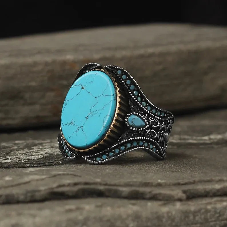 Men's round turquoise antique silver alloy ring showing simple band design