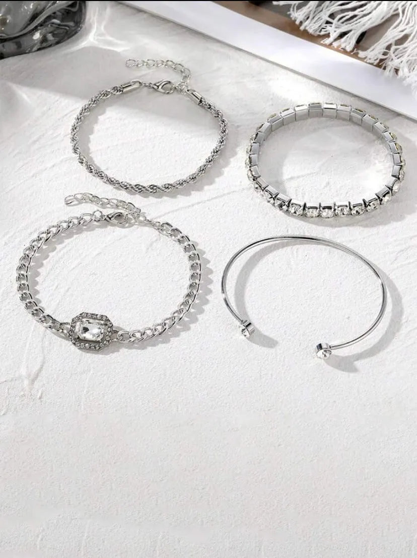 Women's retro geometric alloy bracelet four-piece set showing square diamond detailing on metal chain
