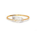 Geometric silver-toned ring setting with a central oval of blue and white banded agate stone on a woman's hand.