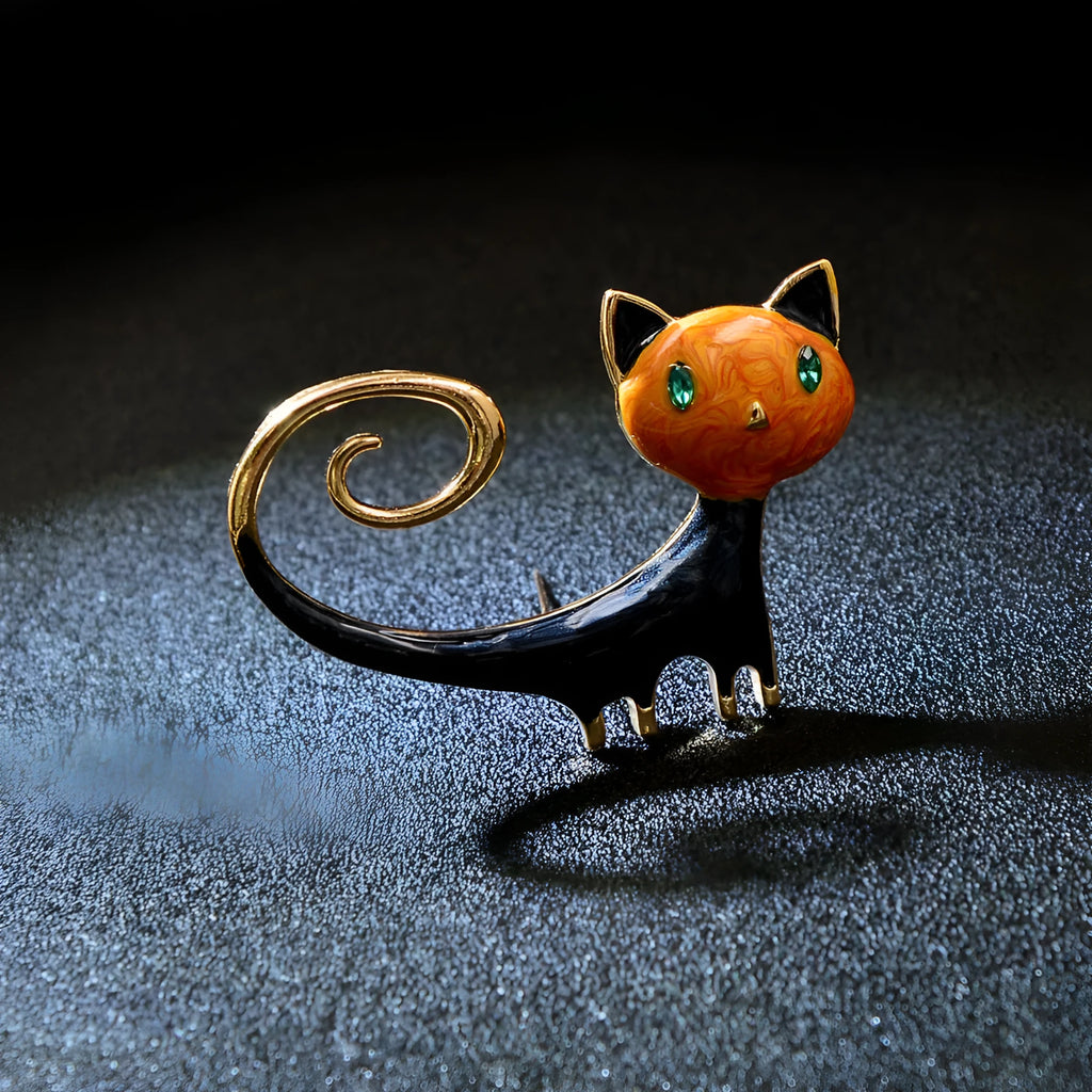 Personalised painted cat tail up brooch in alloy metal, available in white or orange colour options.