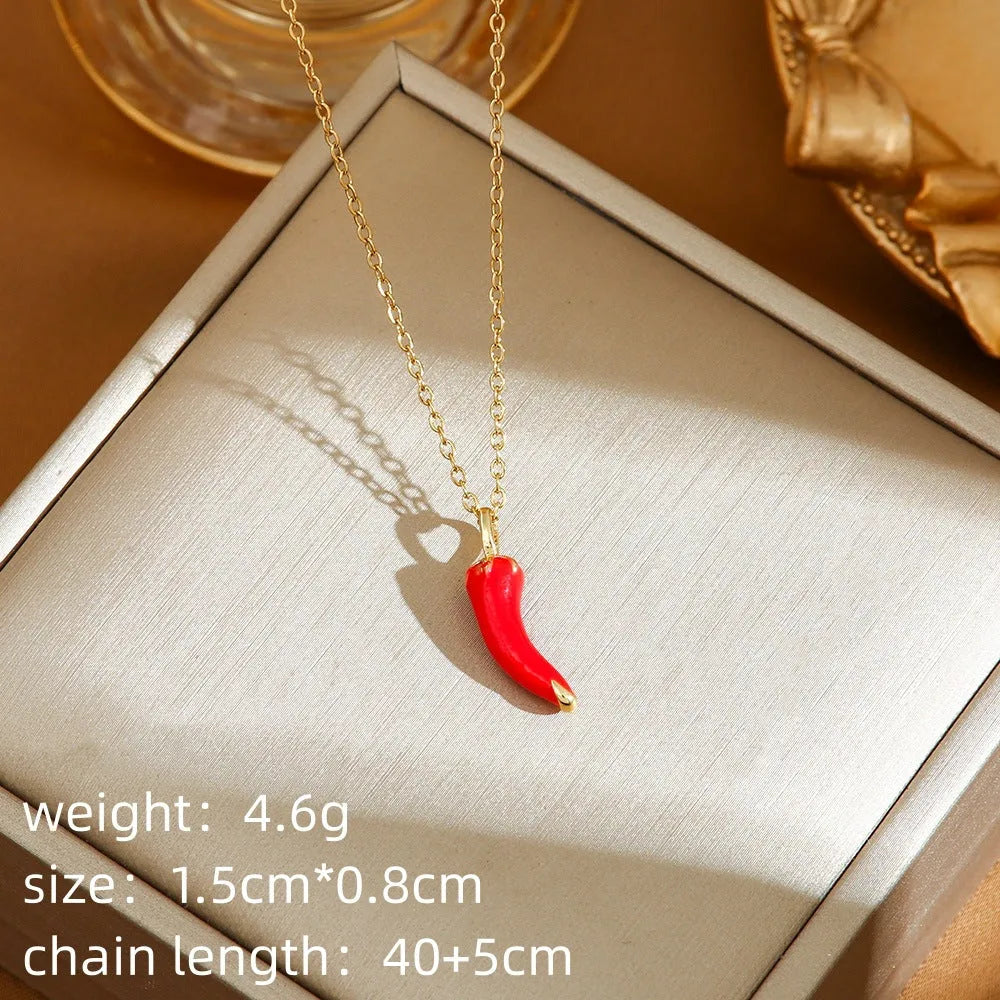 Women's delicate titanium steel necklace with a small cherry charm pendant on an O-ring chain.