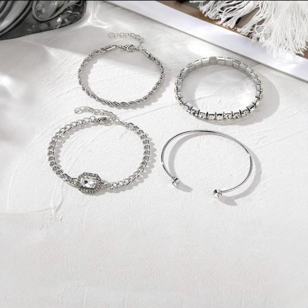 Women's retro geometric alloy bracelet four-piece set showing square diamond detailing on metal chain