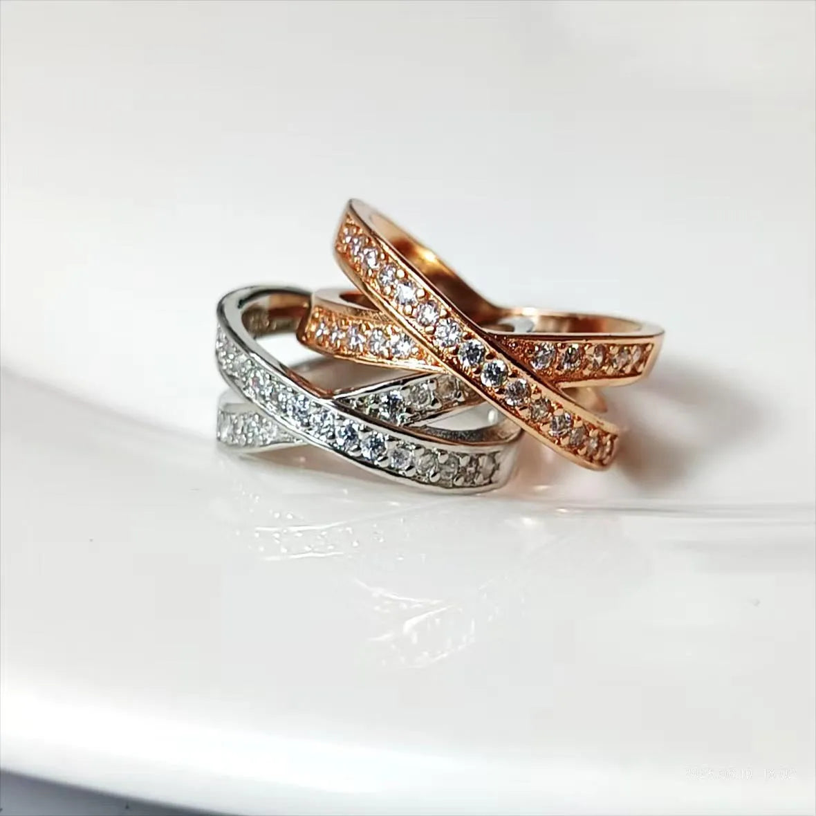 Silver and rose gold micro-inlaid zircon cross ring on copper alloy base with geometric heart design