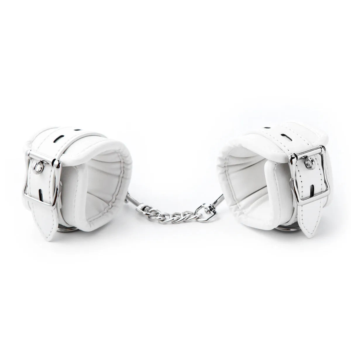 White PU sponge bondage set showing handcuffs, footcuffs, and a neck scarf arranged together.