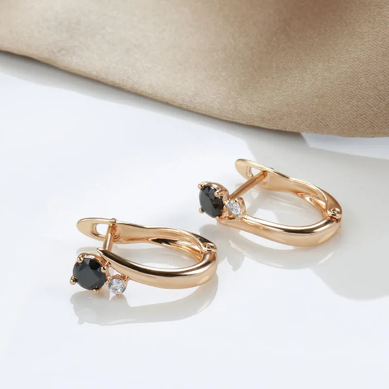 Gold women's earrings with black agate stone, geometric retro design in drop shape