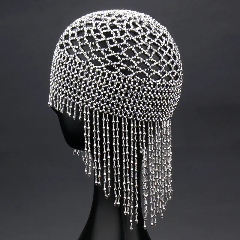 Handmade beaded belly dance hat with tassel decorations in silver colour