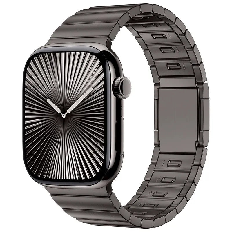 Stainless steel magnetic buckle watch strap for Apple Watch in silver colour on grey background