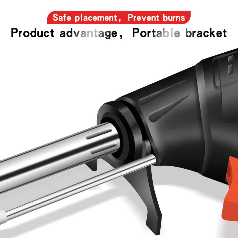 Black G102 alloy soldering gun with light, part of a five-piece kit on a workbench.