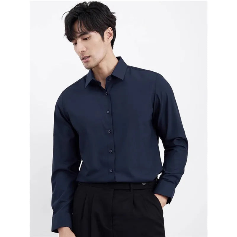Man wearing a wine red slim fit long sleeve casual business shirt.