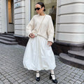 Women's solid colour long cotton skirt with elastic waistband in black or white