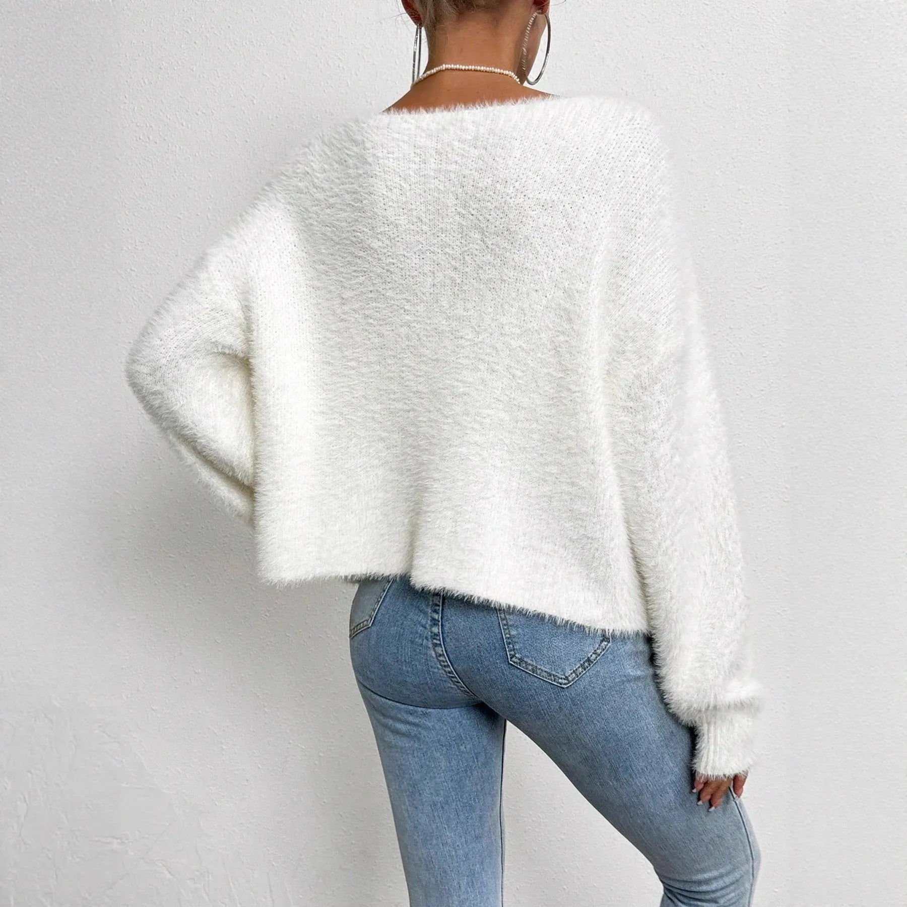 White women's V-neck cardigan with beaded knit texture