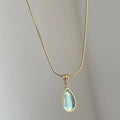 Retro blue and green water drop necklace with titanium steel pendant and snake bones chain