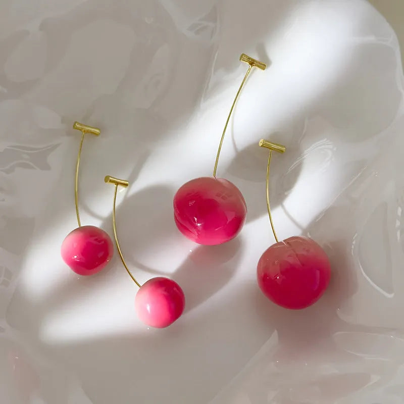 Handmade acrylic peach fruit earrings showing small and large size options with copper findings