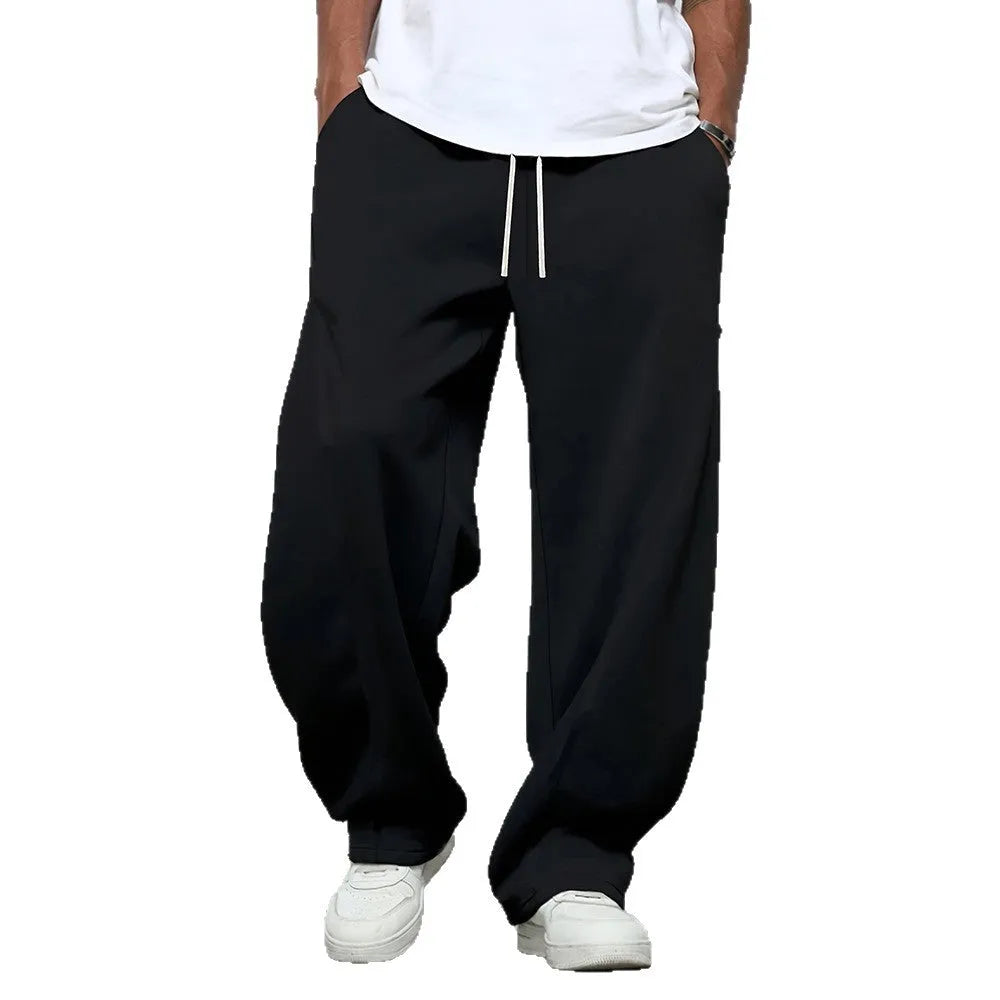 Men's straight-leg casual trousers with elastic waistband in black, dark grey and light grey colours